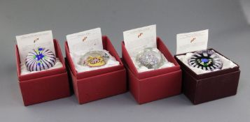 Four Perthshire limited edition glass paperweights; Millenium Weight LE 500, Flower on Twisted Canes