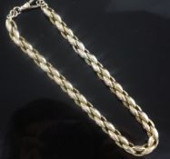 An early 20th century engraved 9ct gold fancy link choker chain, 36cm, 37.3 grams.