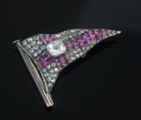A late Victorian gold and silver, ruby and rose cut diamond set brooch modelled as a pennant, with