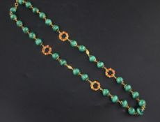 A 14ct gold, enamel and malachite bead necklace.