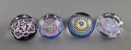 Four Whitefriars concentric millefiore glass paperweights, 1971 and 1979, a millefiore closepacked