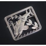 A Georg Jensen Danish sterling silver dolphin brooch no.251, designed by Arno Malinowski, import