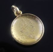 A George III 1792 spade guinea, in 18ct gold mounted convex glass pendant, 1.25in.