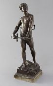 Francois Raoul Larche (1860-1912). A bronze figure of David, standing holding a sword, signed,