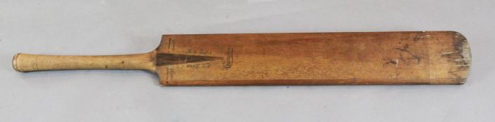 A 1920's A.W. Cochrane giant size Champion cricket bat, made for advertising purposes, 4ft 6in.
