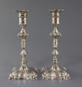 A pair of George V 18th century style candlesticks by George Edward & Sons, with waisted knopped