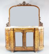 A Victorian marquetry inlaid figured walnut credenza, with arched mirrored back and white marble