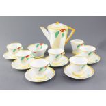 A Shelley Sunray pattern vogue shape sixteen piece coffee set, decorated in the red, green, beige