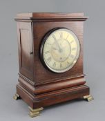 C. Love, Old Bond Street. A Regency rosewood bracket timepiece with brass dial and signed single