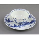 A Vauxhall blue and white tea bowl and saucer, c. 1755-57, painted in underglaze blue with a