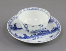 A Vauxhall blue and white tea bowl and saucer, c. 1755-57, painted in underglaze blue with a