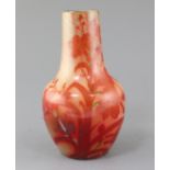 A French art pottery lustre vase, in the manner of Leon Castel, late 19th century, decorated in ruby