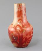 A French art pottery lustre vase, in the manner of Leon Castel, late 19th century, decorated in ruby