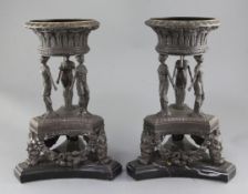 A pair of classical style bronze and black marble centrepieces, height 15.5in.