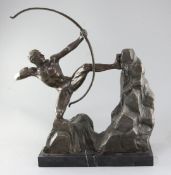 A bronze figure of a nude archer standing upon a rocky outcrop, on black marble plinth, 22in.