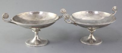 A pair of George V silver tazze by James Dixon & Sons, with lion mask roundel handles, Sheffield,