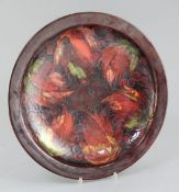 A large Moorcroft flambé leaf and berry dish, c.1928-36, impressed mark W. Moorcroft Potter to HM