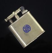 A Dunhill 14ct gold lighter, with blue enamelled monogram, 47mm.