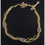 An early 20th century gold triple strand Albertina ropetwist chain, with floral enamelled plaques,