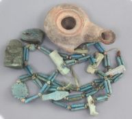 An 'Ancient Egyptian' beadwork necklace, 27in., two additional beads and a terracotta oil lamp