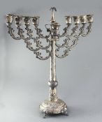 A late 19th/early 20th century large continental repousse silver Hanukkah Menorah, with ornate