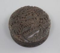 A 19th century Chinese tortoiseshell snuff box, carved in relief with figures in boats, pagodas