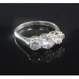 A 1940's platinum and three stone diamond ring, with an approximate total diamond weight of 1.