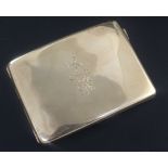 A George V 9ct gold concave cigarette case, with engraved monogram and crest and interior military