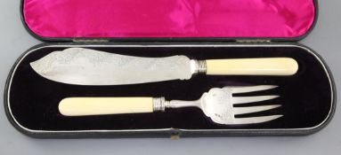 A cased pair of Victorian ivory handled silver fish servers by Goldsmiths Alliance, London, 1890.