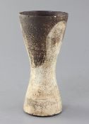 Hans Coper (1920-1981). A waisted vase stoneware vase, the surface with alternating cream and dark