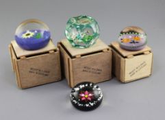 Four William Manson Senior glass paperweights; magnum Sunflower and Lupin, dated 1998, Dogwood Rose,