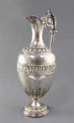 A Victorian silver ewer by Frederick Elkington, with embossed band of classical figures, on pedestal