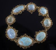 A late 19th century Middle Eastern? gold and turquoise set bracelet, each cabochon inlaid with