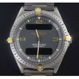 A gentleman's Breitling Aerospace titanium quartz wristwatch, with digital and analogue blue dial,