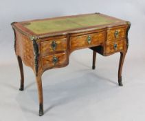 A Louis XV style parquetry and kingwood bureau plat with green skiver and five drawers, W. 3ft