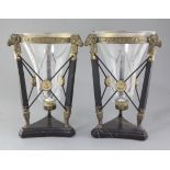A pair of classical style bronze and marble hurricane lanterns, with flared glass shades, height