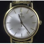 A gentleman's gold Omega Seamaster de Ville automatic wrist watch, with baton numerals, on Omega