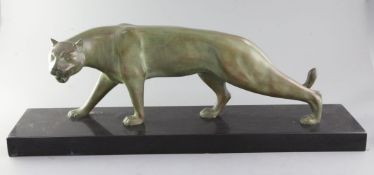 J. Brault. An Art Deco green patinated bronze model of a panther, on black marble plinth, width 27.