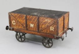 An early 20th century oak smoker's casket, modelled as a GWR coal wagon, 13.25in.