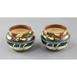 A pair of Foley Intarsio small pots, each decorated with a continuous design of geese in a