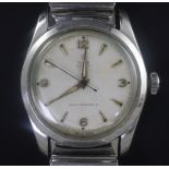 A gentleman's 1940's/1950's stainless steel Tudor Oyster Royal manual wind wrist watch, with baton