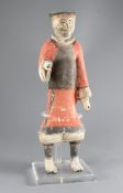 A large Chinese polychrome pottery figure of a standing soldier, Han dynasty (206BC - 220AD),