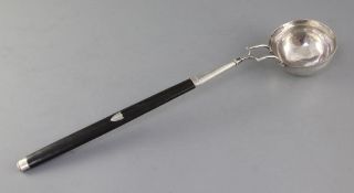An early 19th century Italian 800 standard silver punch ladle, with ebonised handle, maker's mark