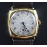 A gentleman's 1920's 18ct gold Rolex manual wind wrist watch, with shaped square case and Arabic