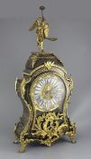 A 19th century French Louis XV style ormolu and boulle work mantel clock, surmounted with a figure