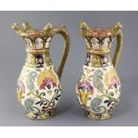 A pair of J.Fischer, Budapest pottery puzzle jugs, late 19th century, each decorated with Persian