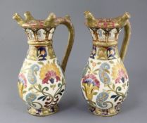 A pair of J.Fischer, Budapest pottery puzzle jugs, late 19th century, each decorated with Persian