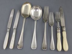 A part canteen of George V silver Old English pattern flatware by Atkin Brothers, comprising