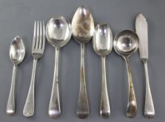 A matched part canteen of George V silver Old English pattern cutlery, with engraved initial,