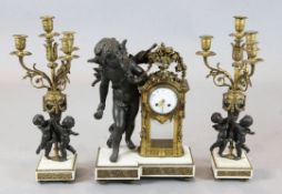 An early 20th century French bronzed spelter, ormolu and white marble clock garniture,